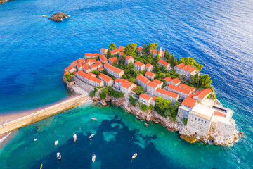 Old town and beach Sveti Stefan sea island, Budva, Montenegro, Europe