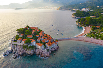 Old town and beach Sveti Stefan sea island, Budva, Montenegro, Europe