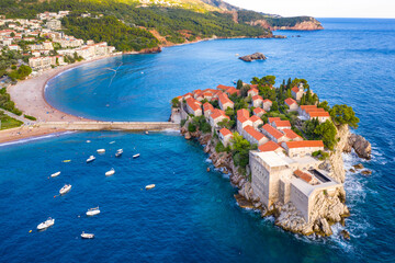 Old town and beach Sveti Stefan sea island, Budva, Montenegro, Europe