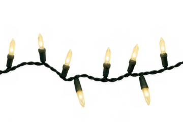 Glowing christmas string lights on dark green wire against a transparent background creating a festive holiday decoration