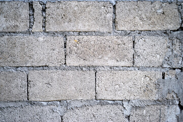 Gray Concrete Block Wall With Rough Texture and Vintage Appearance
