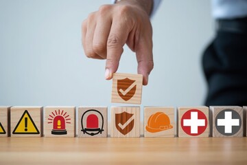 Safety and security at work, hand placing protection icon block