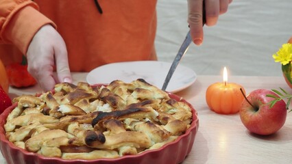 A family with young children celebrates Thanksgiving at home with roast turkey and traditional dishes. The table is set. The concept is one of celebration, tradition, love, care, and respect. They loo