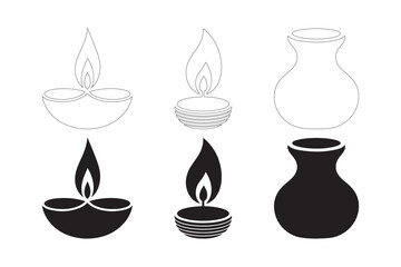 Three traditional indian oil lamps and a vase in black and white