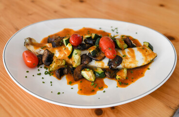 Fish Fillet with Roasted Vegetables and Savory Red Sauce