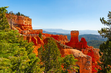 Bryce Canyon National Park, located in Utah state. The red, orange, and white colors of the rocks...