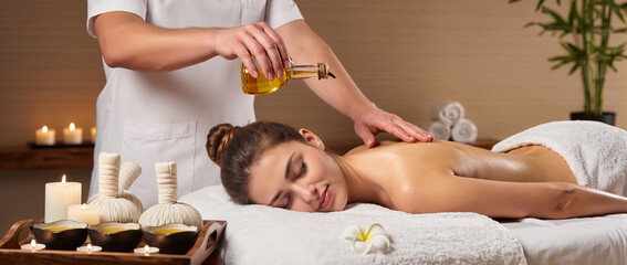 young woman getting spa treatment