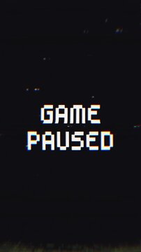 Retro pixel art GAME PAUSED message with vintage glitch effects, chromatic aberration, and static noise. Ideal for gaming intros, streams, or vintage tech themes.