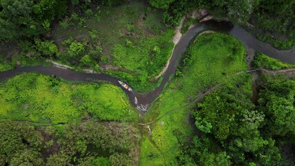 Aerial images taken with drones of a ravine near the Nanay River, a major river surrounded by vast flooded forests of the Peruvian Amazon in Iquitos, Peru, within the Amazon rainforest - Powered by Adobe