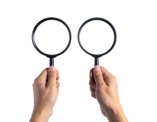 Two hands hold two magnifying glasses