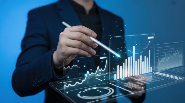 A person wearing a suit analyzing digital data graphs on screen. This evokes a sense of analytical prowess and strategic thinking