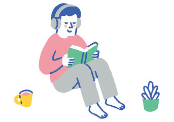 Man reading with headphones on
