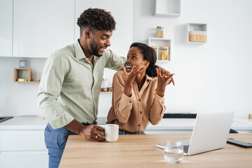 African american couple feeling surprised receiving good news