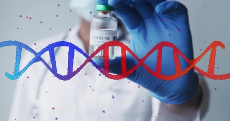 Holding medical worker in lab coat, mask, blue gloves showing COVID-19 vial with DNA helix overlay
