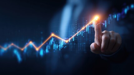 Businessman hand touching glowing upward trending financial chart data