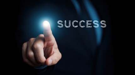 Naklejka premium Finger touching glowing success word on dark background