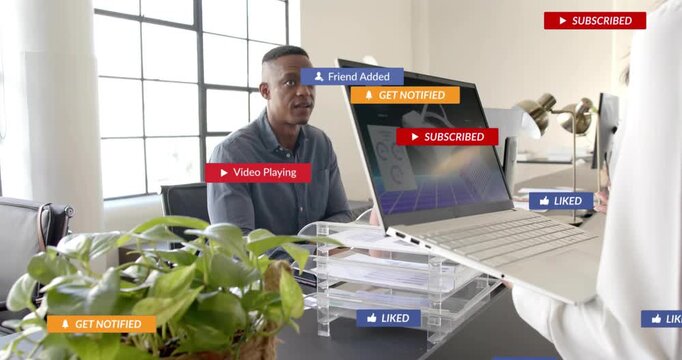 Rep holding laptop and showing VR product for marketing, notifications covering man then clearing