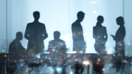 Silhouettes of business people overlaid with a digital network graphic.