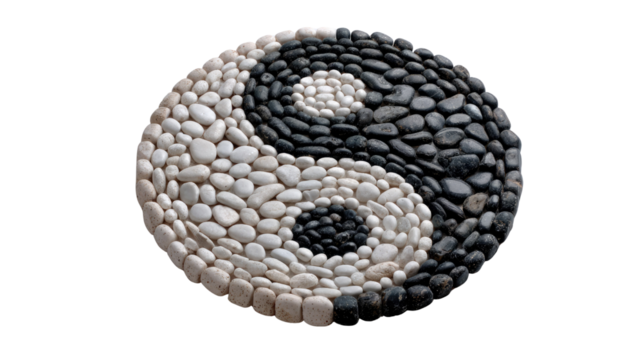 Yin and Yang Symbol: The intricate Yin and Yang symbol, beautifully constructed with contrasting black and white stones, exemplifies the fundamental balance and harmony of opposing forces.