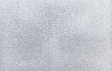 Close-up of white smooth PE foam surface with soft matte finish, perfect for packaging, protective layer, or minimal industrial background design concept.
