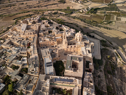 Malta Mdina old town historic walled city with St Pauls cathedral aerial drone view.
