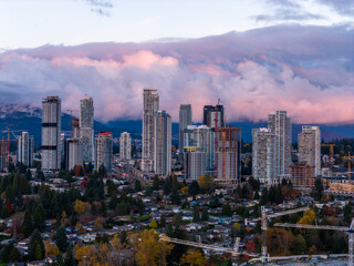 Fototapeta premium Dramatic Burnaby Skyline With High Rise Buildings In Greater Vancouver At Sunset