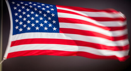 Obraz premium American Flag Waves Against Dark Night Sky.