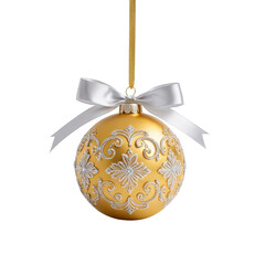 Golden holiday ornament with intricate white detailing, white ribbon