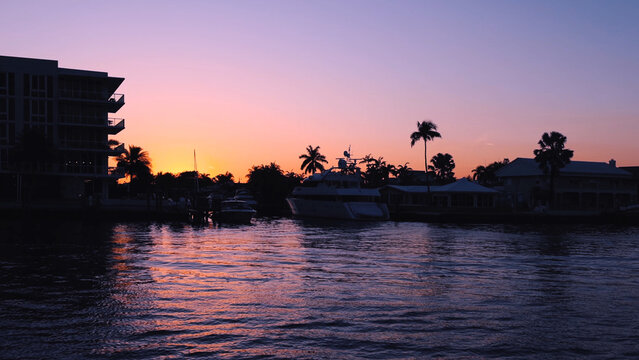 Yachts and sailboats in Fort Lauderdale canals in Florida at sunset