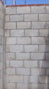 Concrete block wall under construction, concrete work