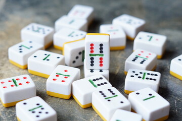 Close up of domino game on abstract surface