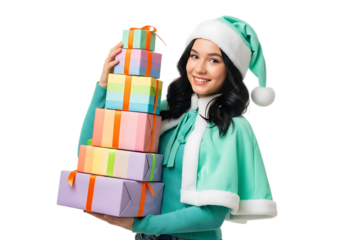 Smiling young woman holding a stack of colorful Christmas gifts wearing a Santa hat and cape isolated on white transparent background