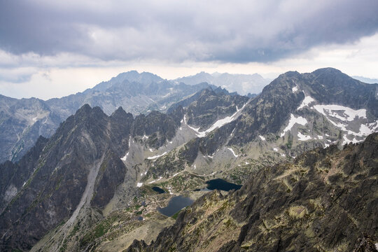 From Lomnick&yacute; &scaron;t&iacute;t, you can see the nearby Skalnat&eacute; pleso (Rocky Tarn) lake and the Mala Studena Valley and other high peaks like Ladovy Peak, Gerlachovsky Peak, Vysoka, and Krivan.