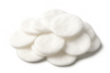 Stack of white round cotton pads for face cleansing, cosmetic hygiene, beauty care, and makeup removing, transparent background