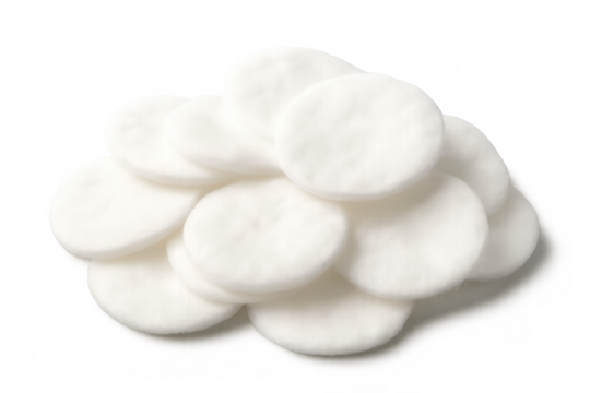 Stack of white round cotton pads for face cleansing, cosmetic hygiene, beauty care, and makeup removing, transparent background