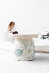 small white cake stand, white marble cake stand with painted feet, dessert pedestal