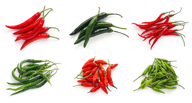 A collection set of Indonesian chili shots, top view of large red and green chili (cabe besar), curly chili (cabe keriting), and bird's eye chili (cabe rawit). A bundle of traditional ingredient.