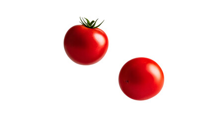Fresh red tomatoes float gracefully in midair, isolated on white
