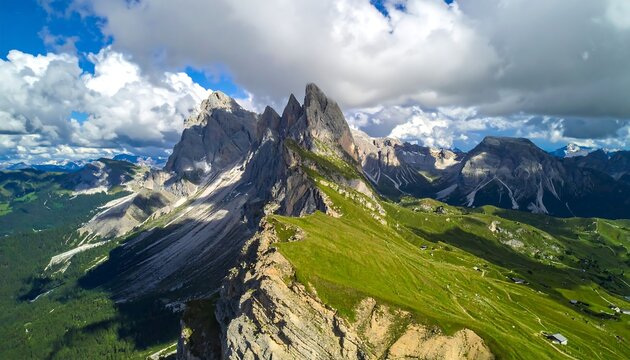 Stunning aerial view showcasing rugged peaks under a cloudy sky