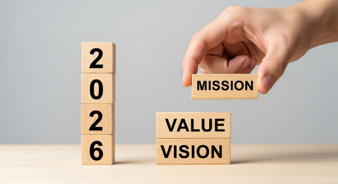 2026 business year end christmas new year mission value vision hand holding wooden block stacking business concept holiday planning