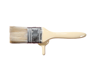Paintbrush dripping beige paint on black background, horizontal
