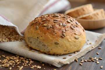 Naklejka premium Seeded Bread Roll with Golden Crust on Cloth – Wooden Surface, Artisan Baking Scene, Conceptual