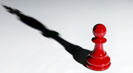 Leadership concept with red chess pawn casting a king shadow for business strategy hidden potential ambition success strength and power