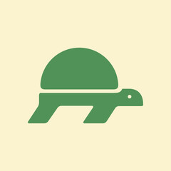 Simple green turtle icon silhouette on a light background.