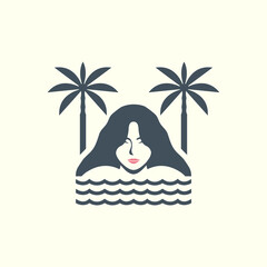 Serene woman relaxing in the ocean between two tropical palm trees.