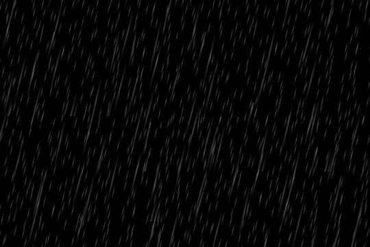 Heavy rain effect falling against a dark black background, a realistic and moody seamless loop overlay for dramatic weather visuals, stormy atmosphere, or environmental backdrop.
