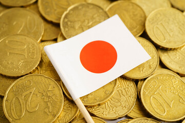 Japan flag on coin and banknote money, finance trading investment business currency concept.