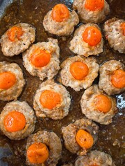 Delicious Vietnamese Thit Trung, a savory dish with egg yolk center