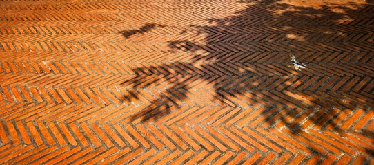 Herringbone brickwork pattern with shadows creating an interesting texture