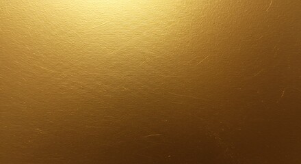 Close-up of a golden textured surface with subtle light gradient and fine scratches